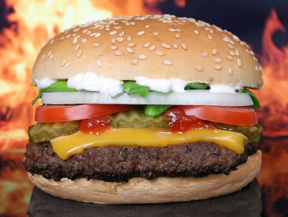 Free Image of Delicious Hamburger With Cheese, Tomato, Lettuce, and Ketchup 