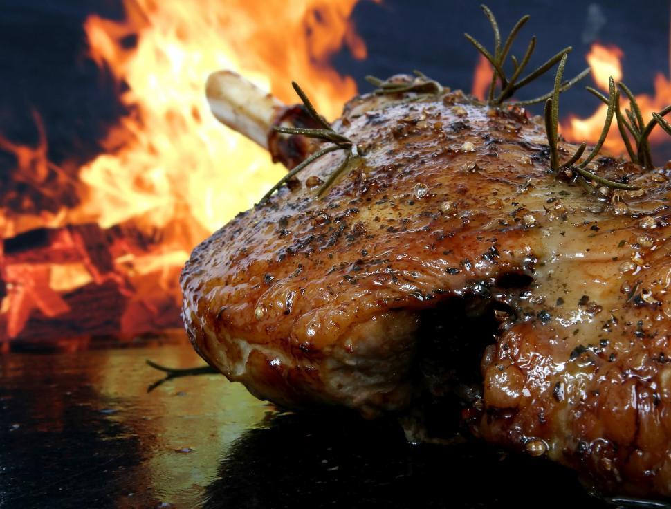 Free Image of Piece of Meat on Table Next to Fire 