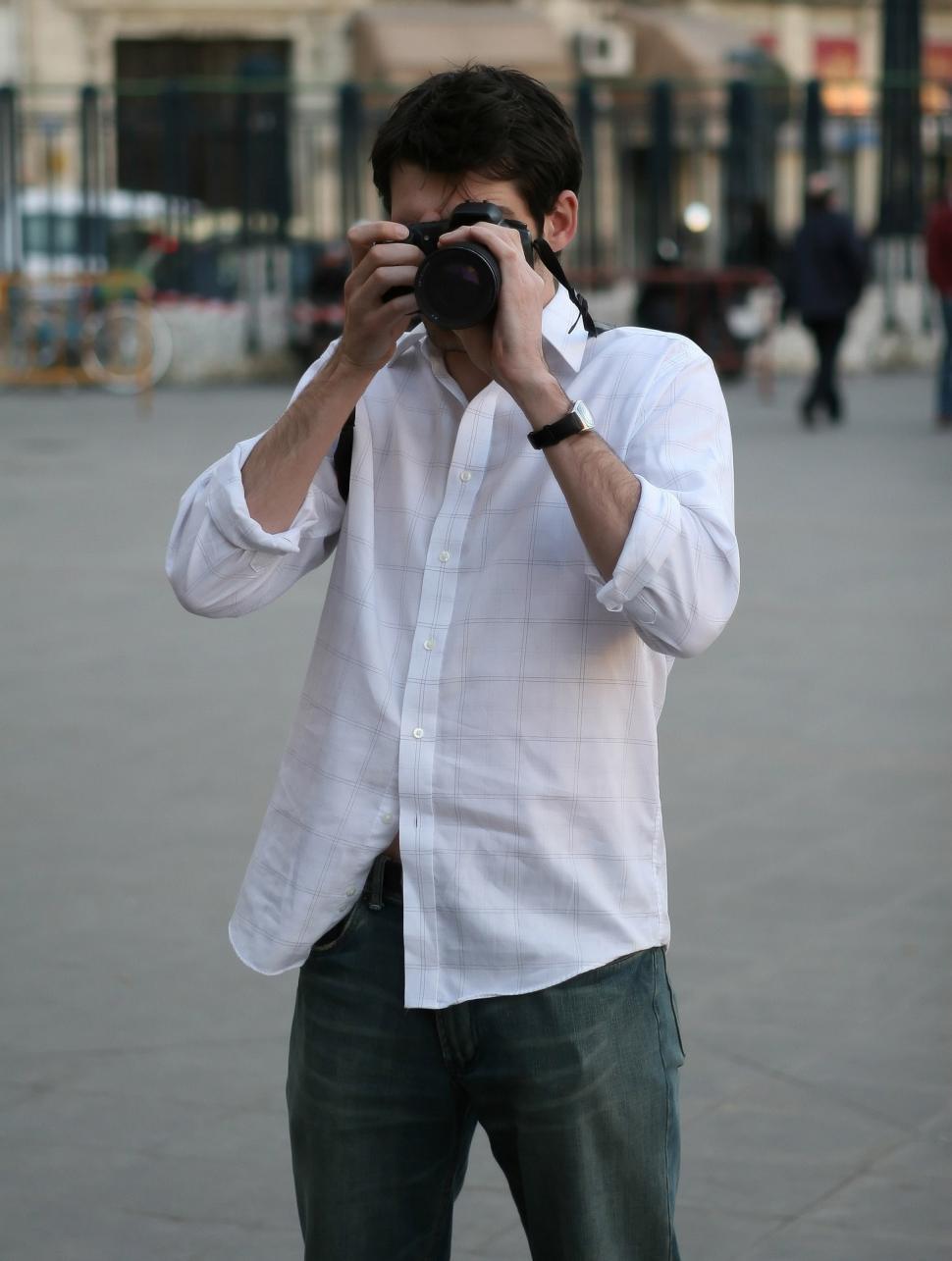 Free Image of Man Taking Selfie With Camera 