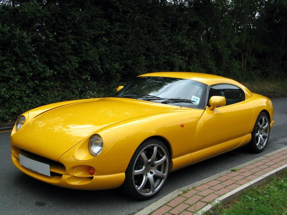 Free Image of Yellow Sports Car Parked on Side of Road 