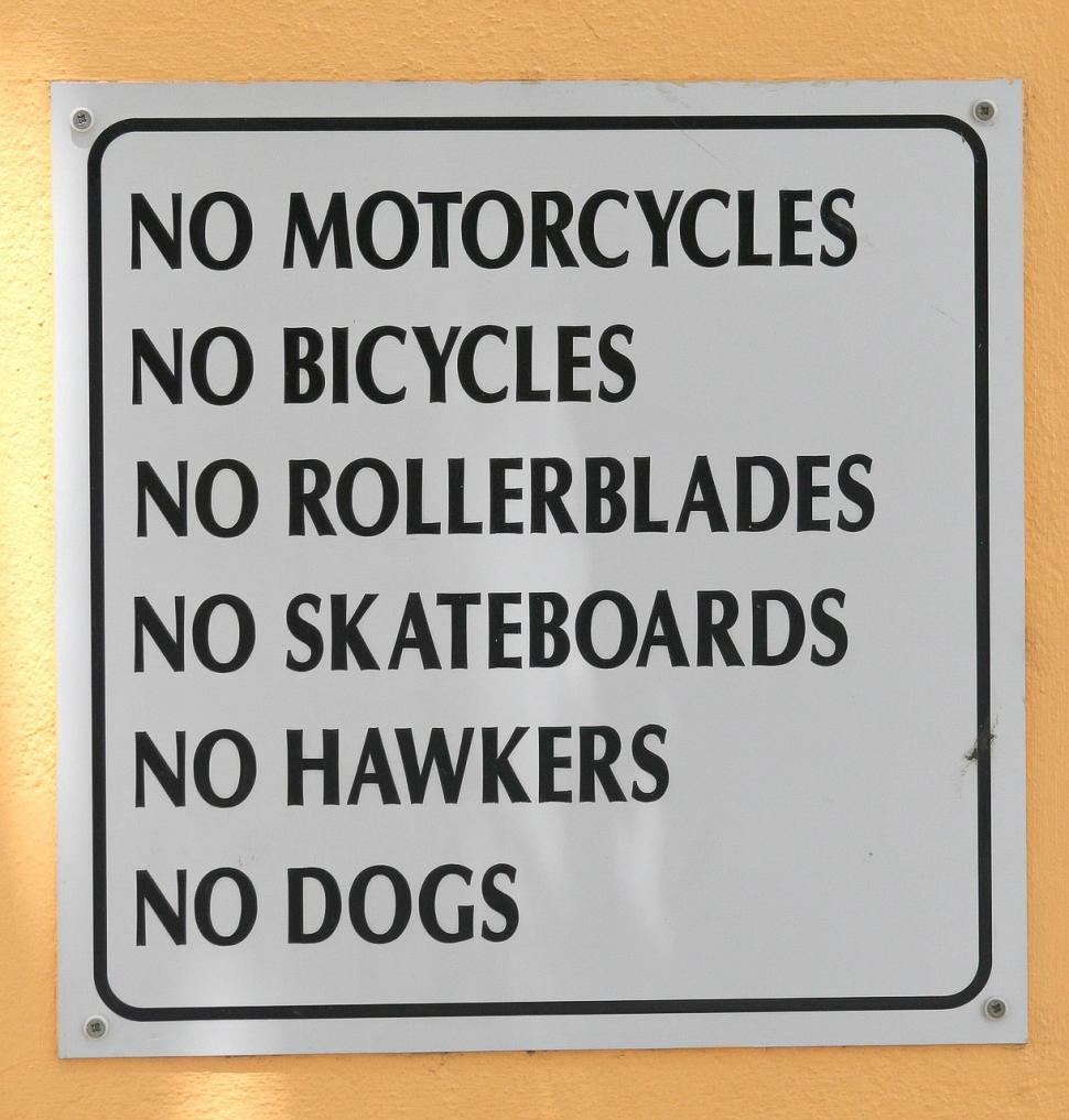 Free Image of No Motorcycles, No Bicycles, No Skateboards Sign on Wall 