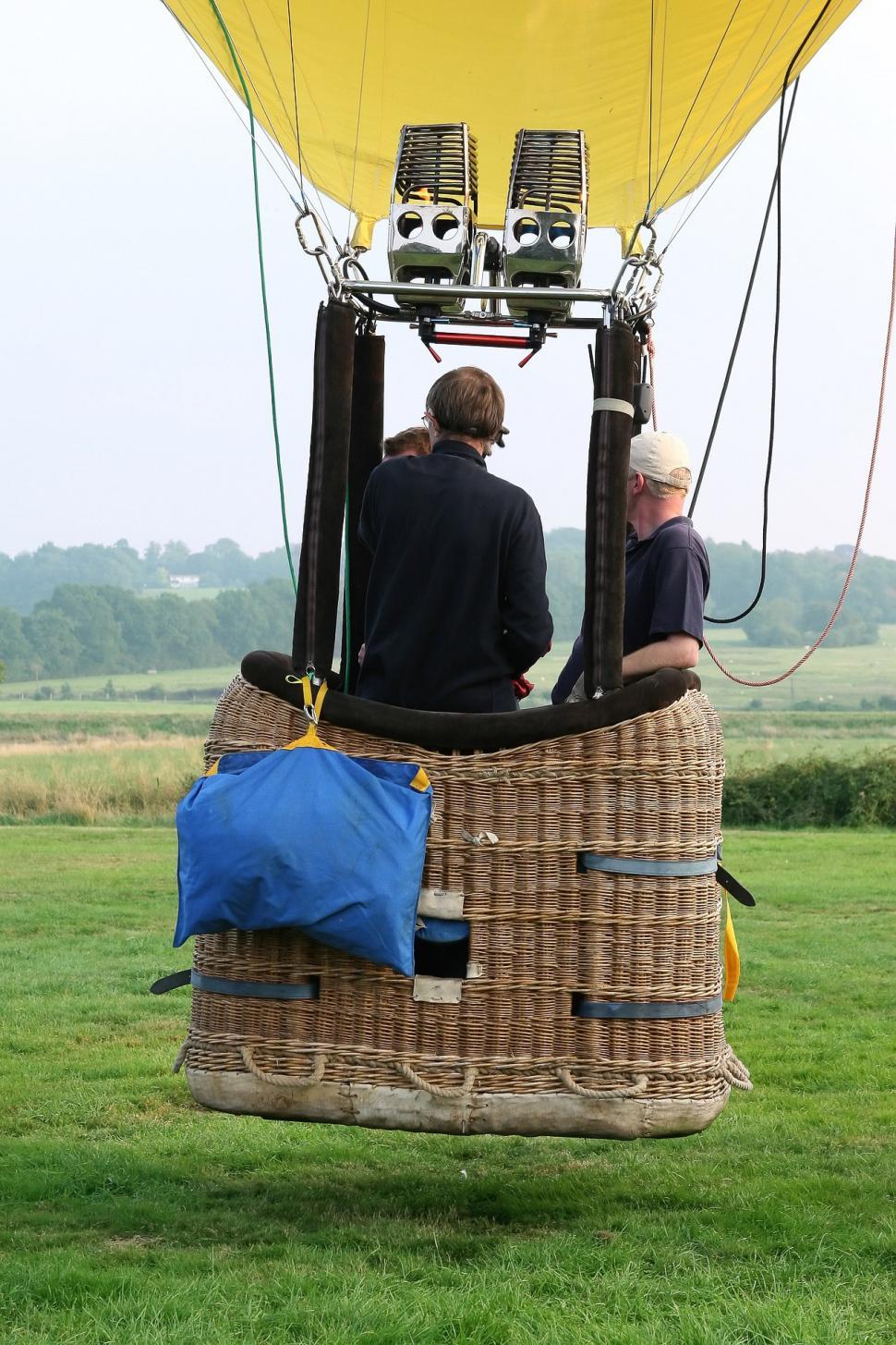 Free Image of People Inside Hot Air Balloon 