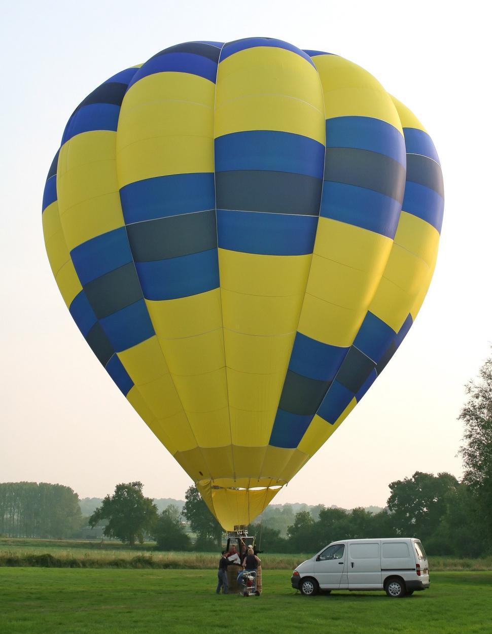 Free Image of Large Yellow and Blue Hot Air Balloon 