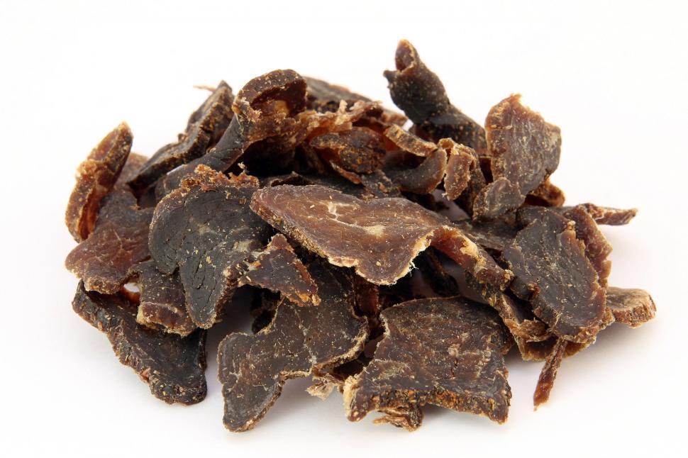 Free Image of Pile of Brown Dog Treats on White Background 
