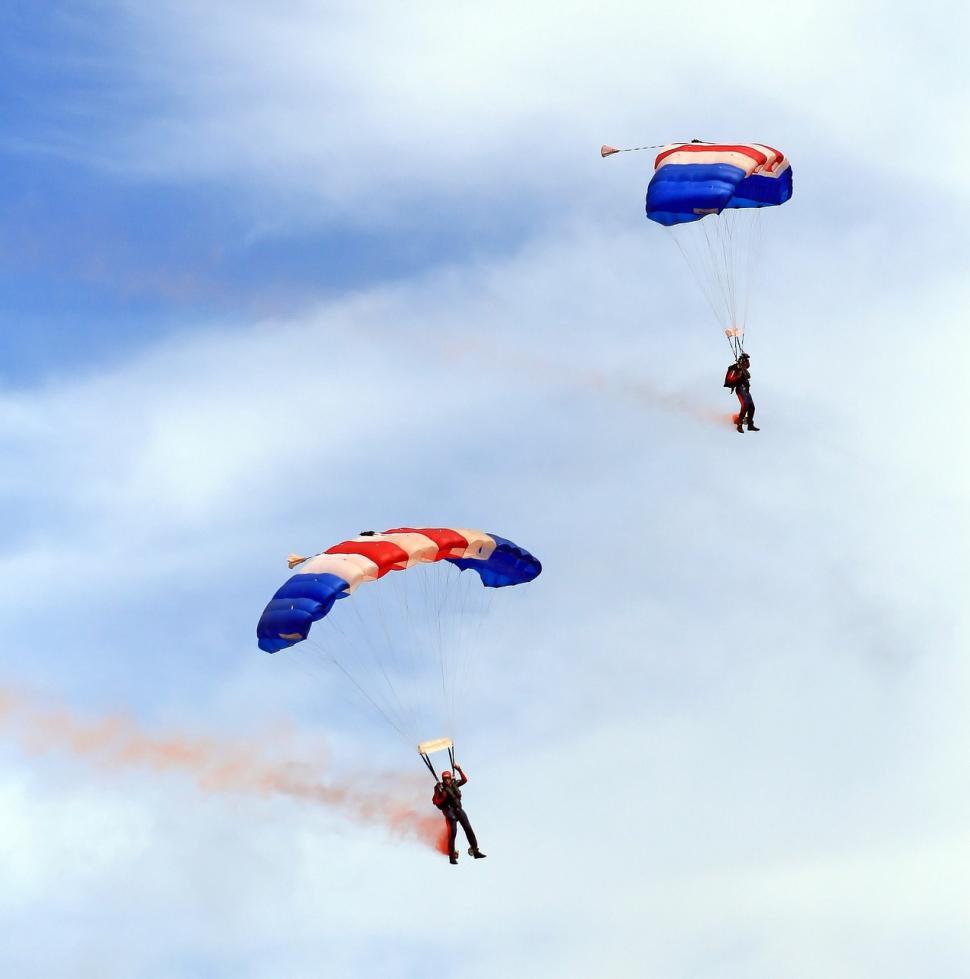 Free Image of Group of People Flying Kites in the Sky 