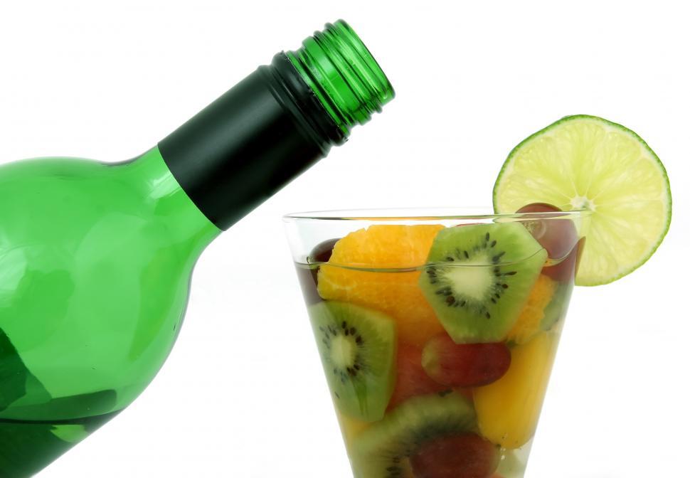 Free Image of Glass of Fruit and Bottle on Table 