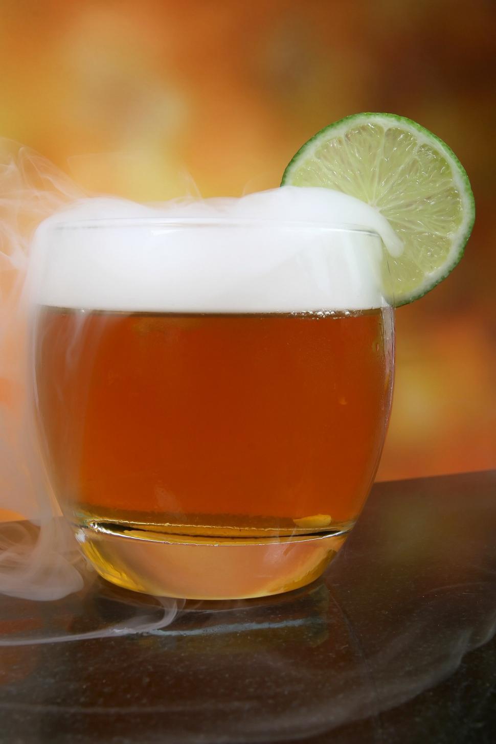 Free Image of Glass of Beer With Lime Wedge 