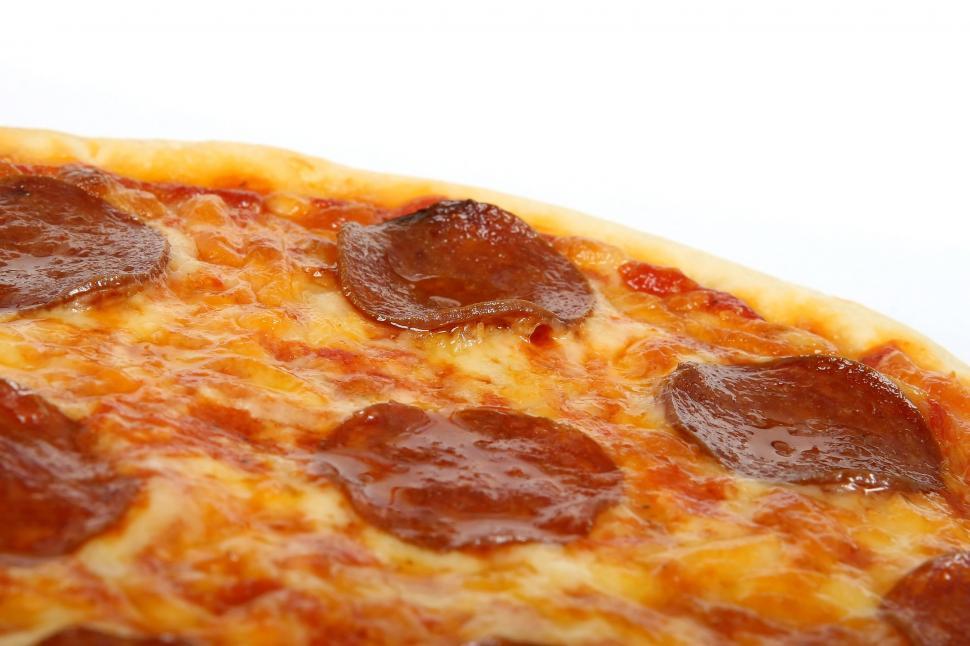 Free Image of Close Up of a Pepperoni Pizza on a White Background 