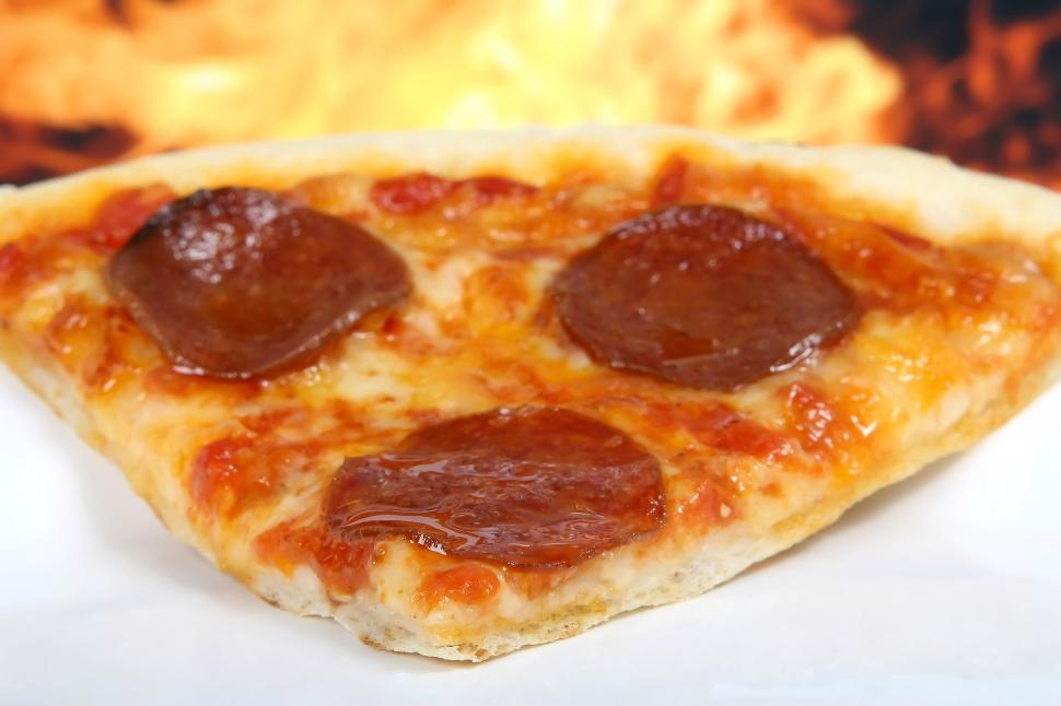 Free Image of Pepperoni Pizza Slice on White Plate 