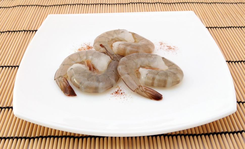 Free Image of White Plate With Shrimp on Bamboo Mat 