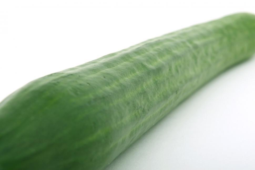 Free Image of Green Cucumber on White Surface 