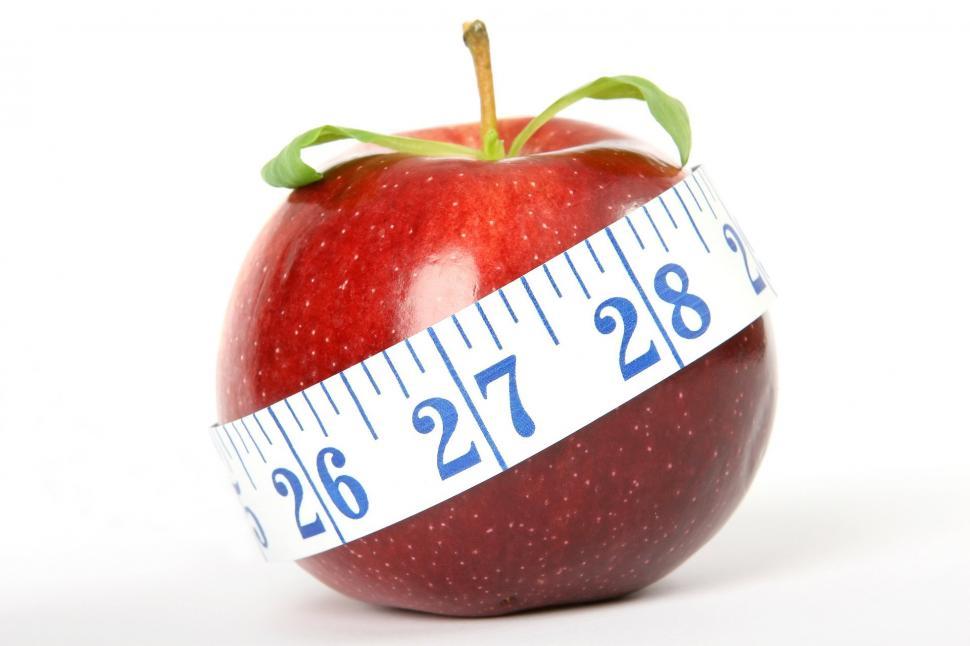 Free Image of Red Apple With Measuring Tape 