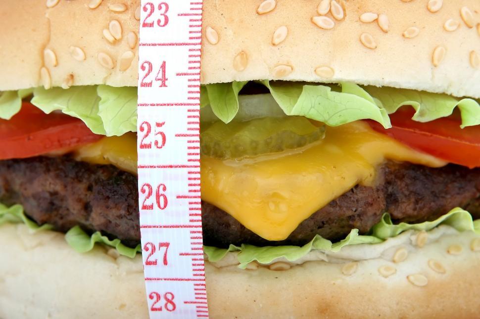 Free Image of Close Up of Hamburger With Measuring Tape 