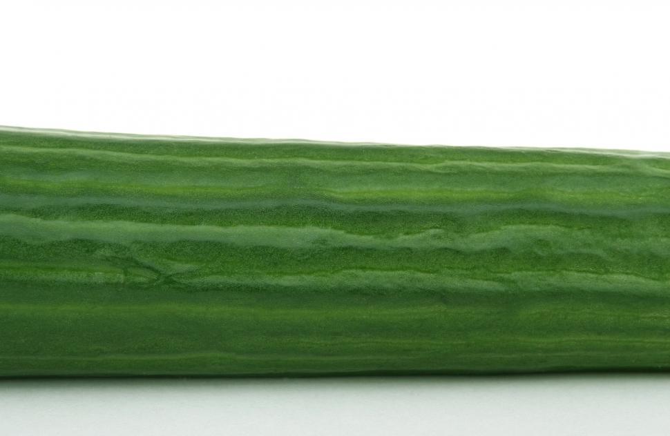 Free Image of Long Green Cucumber on White Table 