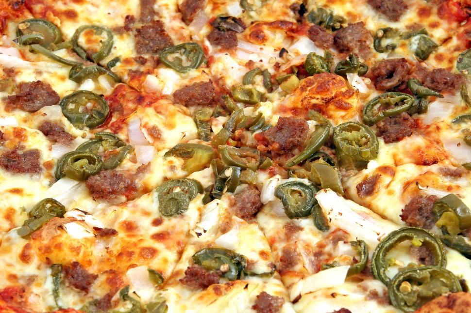 Free Image of Close Up of Pepperoni and Sausage Pizza 