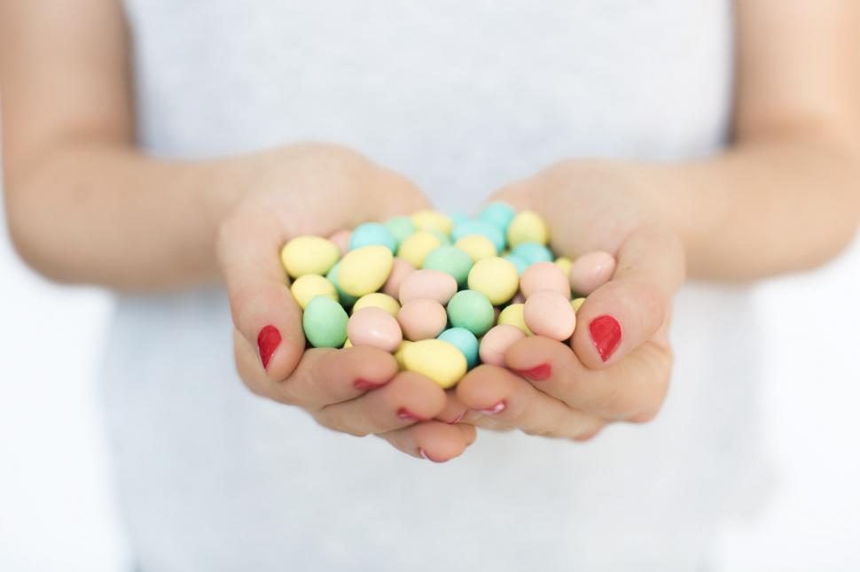 Free Image of Hands Full Of Easter Eggs 