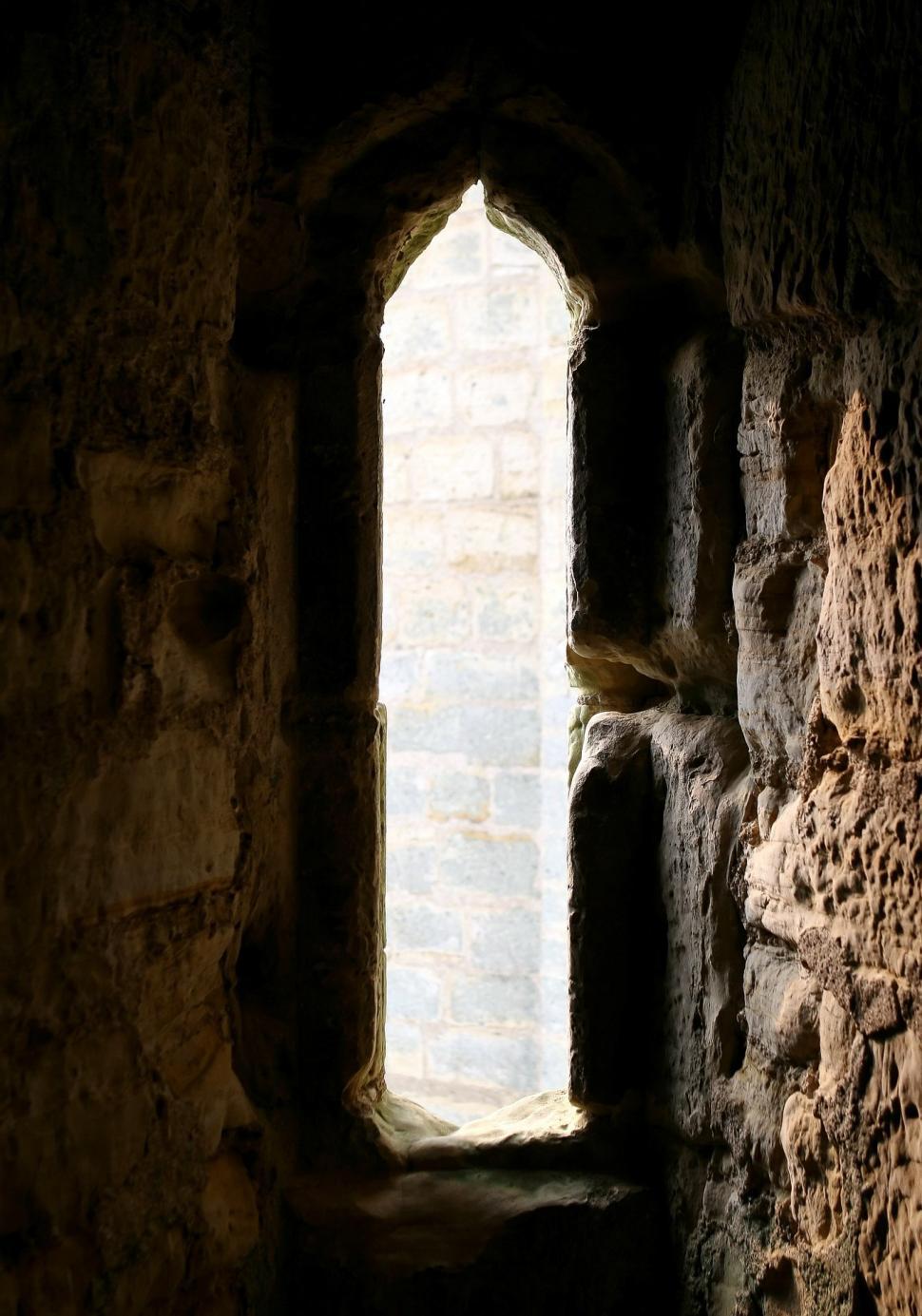 Free Image of Stone Wall With Window 