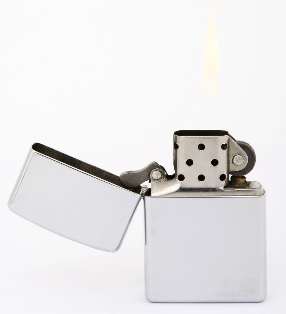 Free Image of White Lighter With Black Dot 