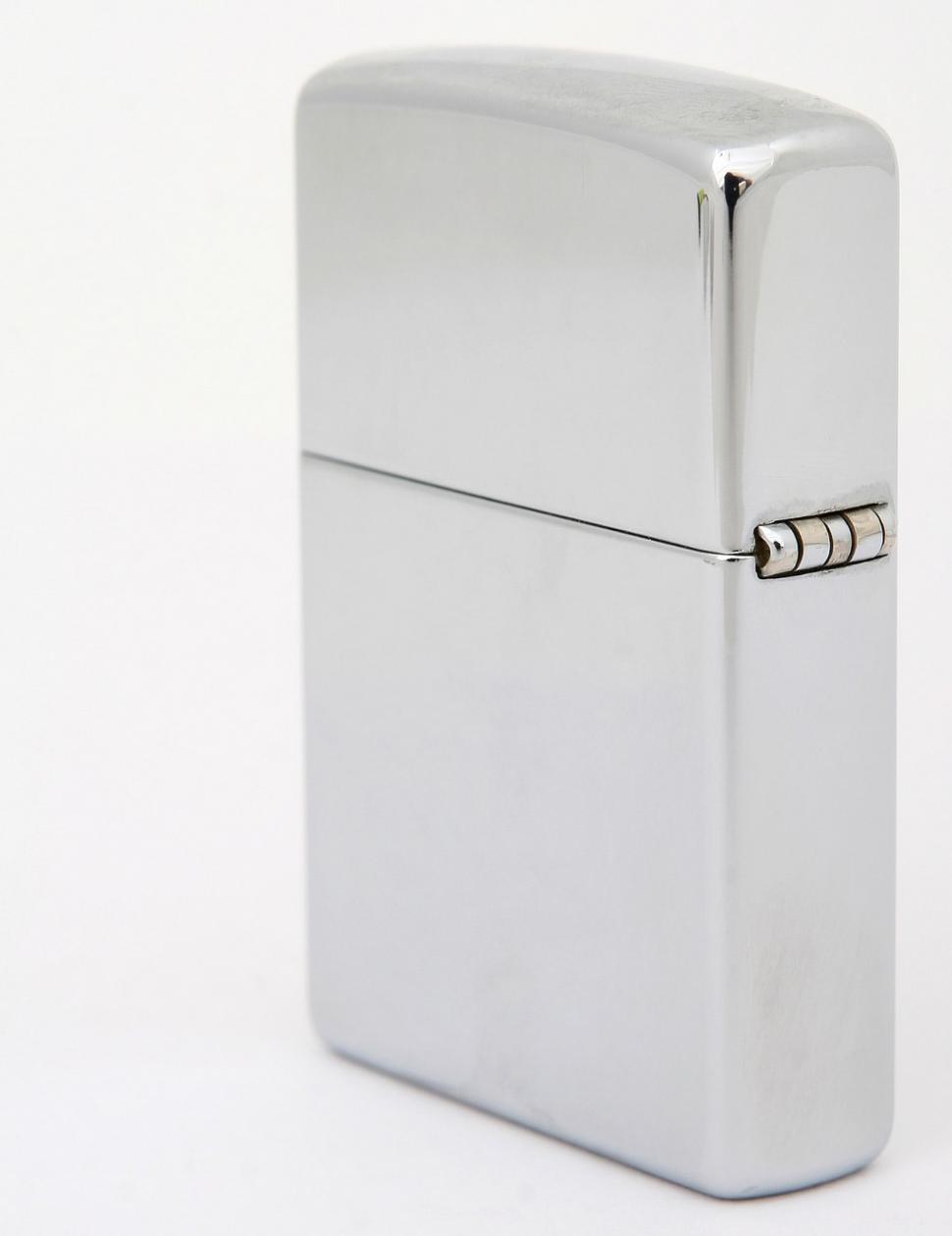 Free Image of Silver Lighter on White Background 