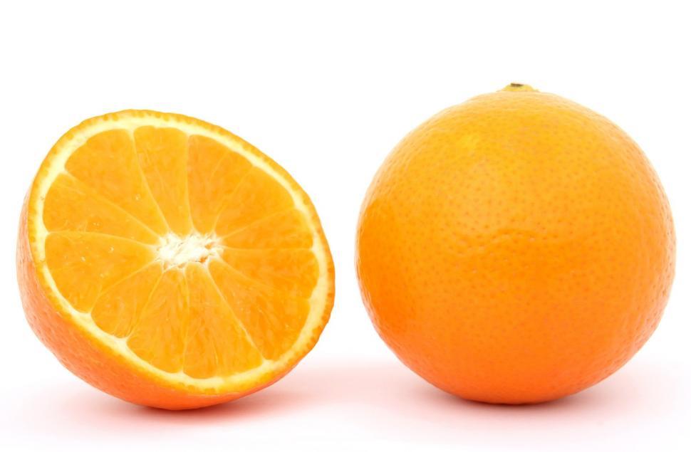 Free Image of Two Halved Oranges on White Background 