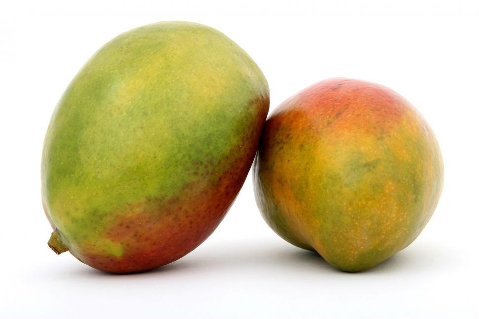 Free Image of Two Mangoes on White Surface 