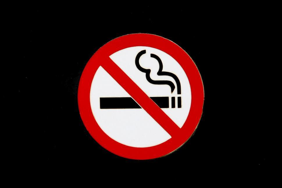 Free Image of No Smoking Sign on Black Background 