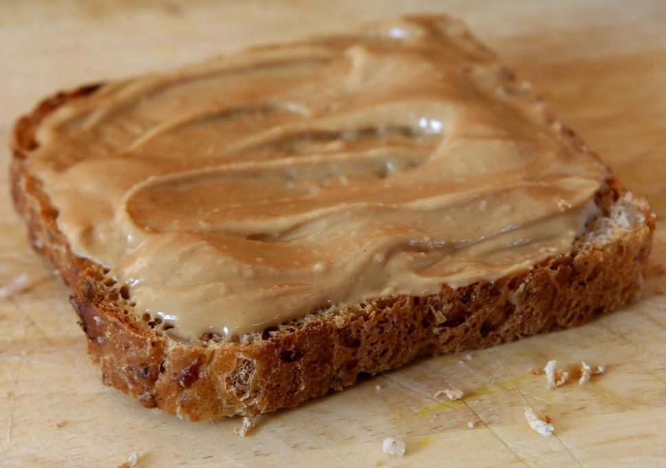 Free Image of Peanut Butter Spread on Bread Slice 