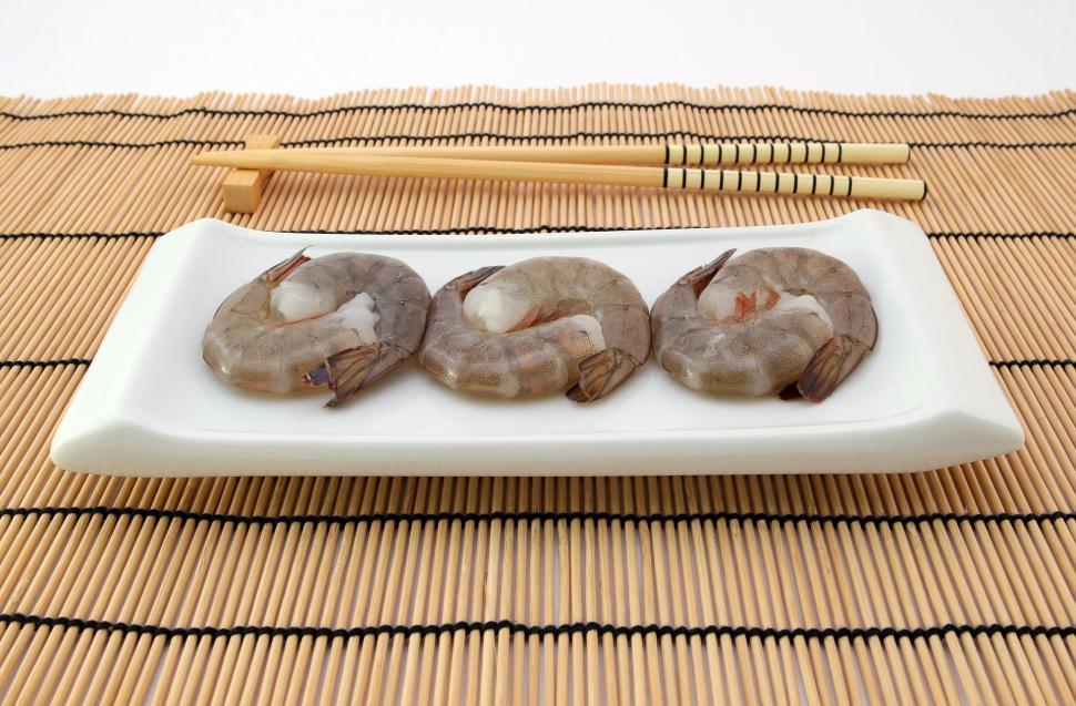Free Image of White Plate With Donuts and Chopsticks 