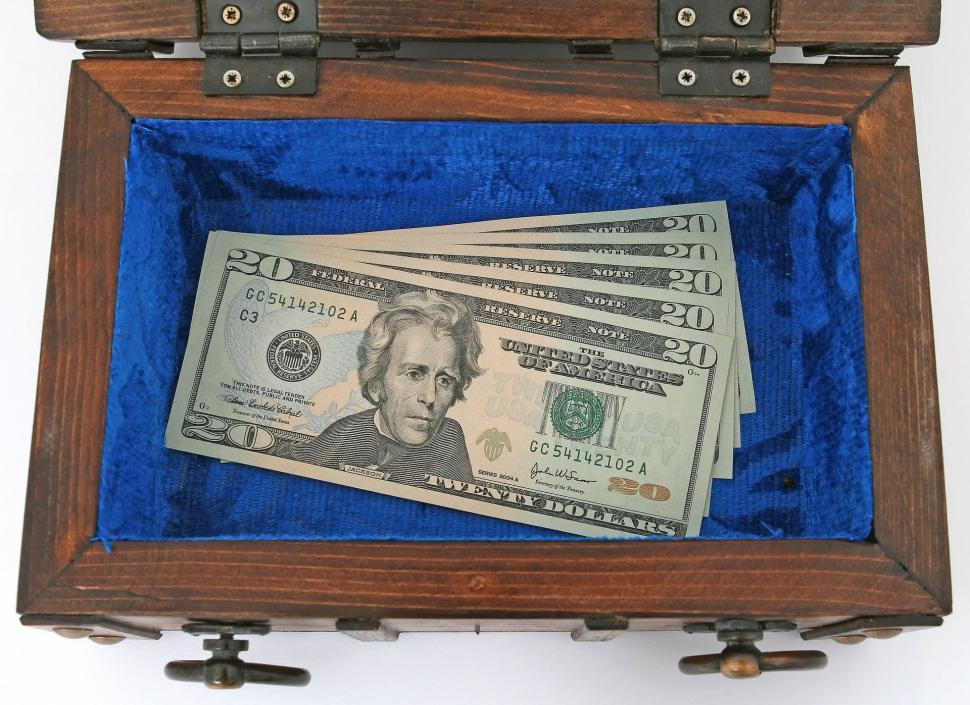 Free Image of Wealth Accumulation in Wooden Box 