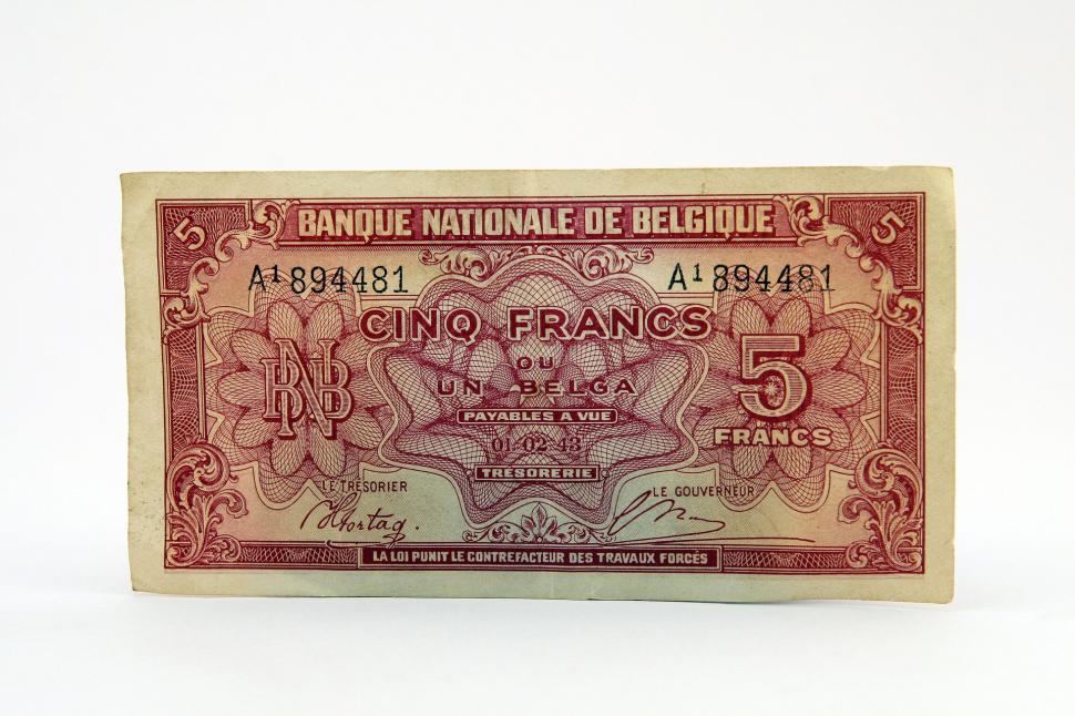 Free Image of Red and White Bank Note on White Background 