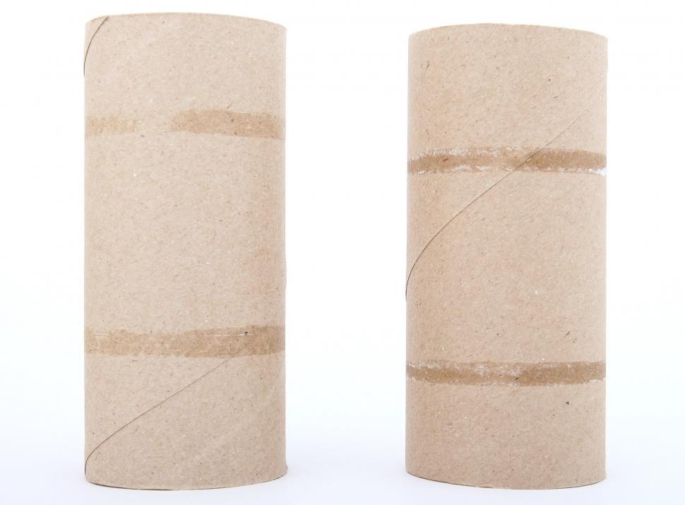 Free Image of Two Rolls of Toilet Paper on a White Background 