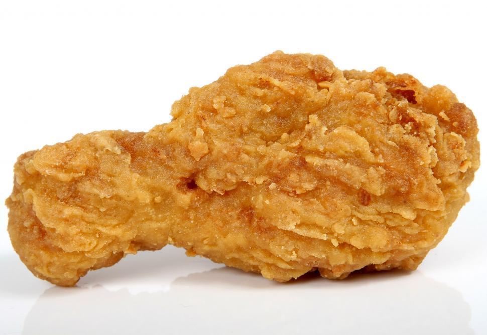 Free Image of Two Pieces of Fried Chicken on a White Background 