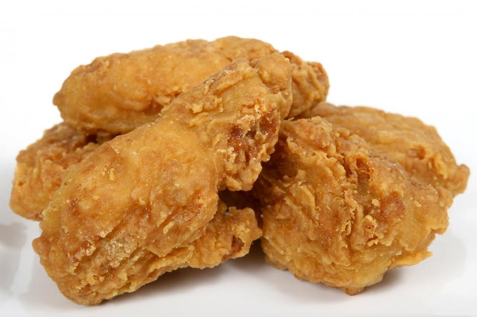 Free Image of Pile of Fried Chicken on White Background 