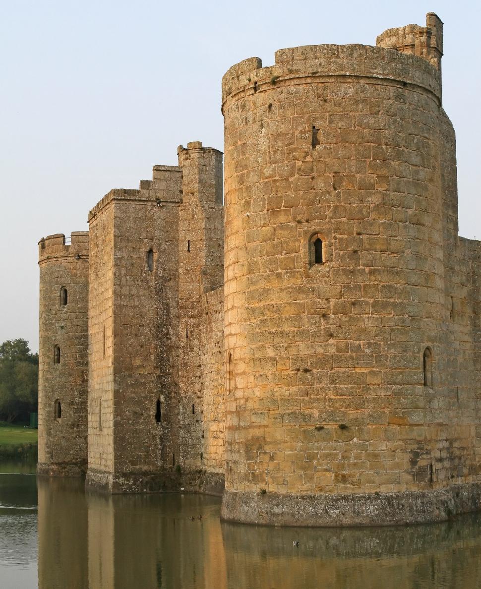 Free Image of Majestic Castle Overlooking Body of Water 