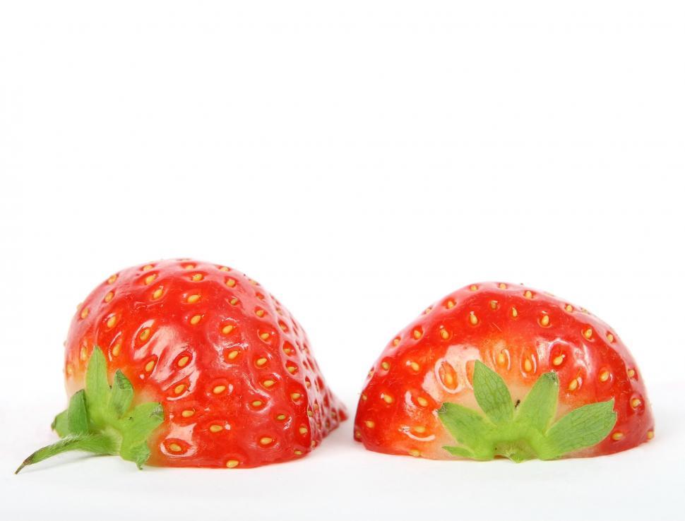 Free Image of Two Ripe Strawberries Sitting Together 