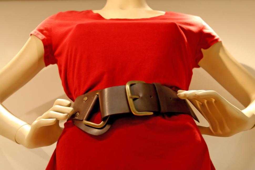 Free Image of Mannequin Wearing Red Dress and Belt 