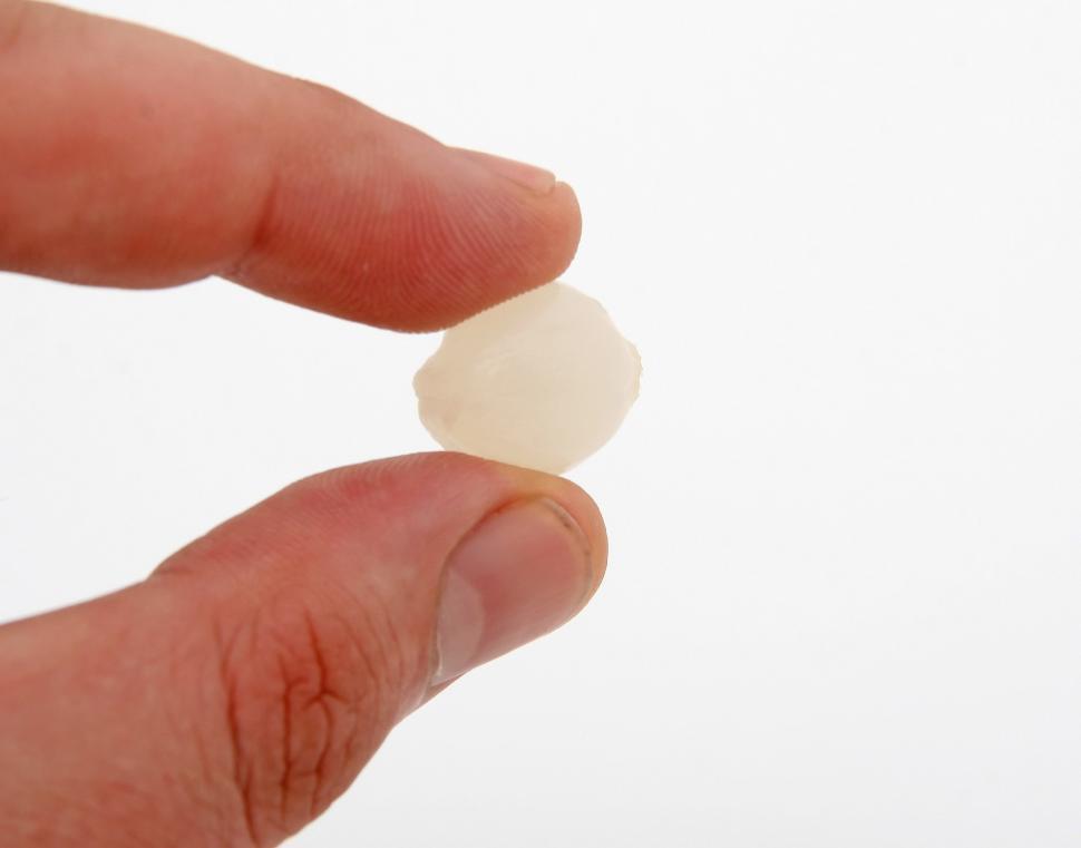 Free Image of Person Holding Pill in Left Hand 