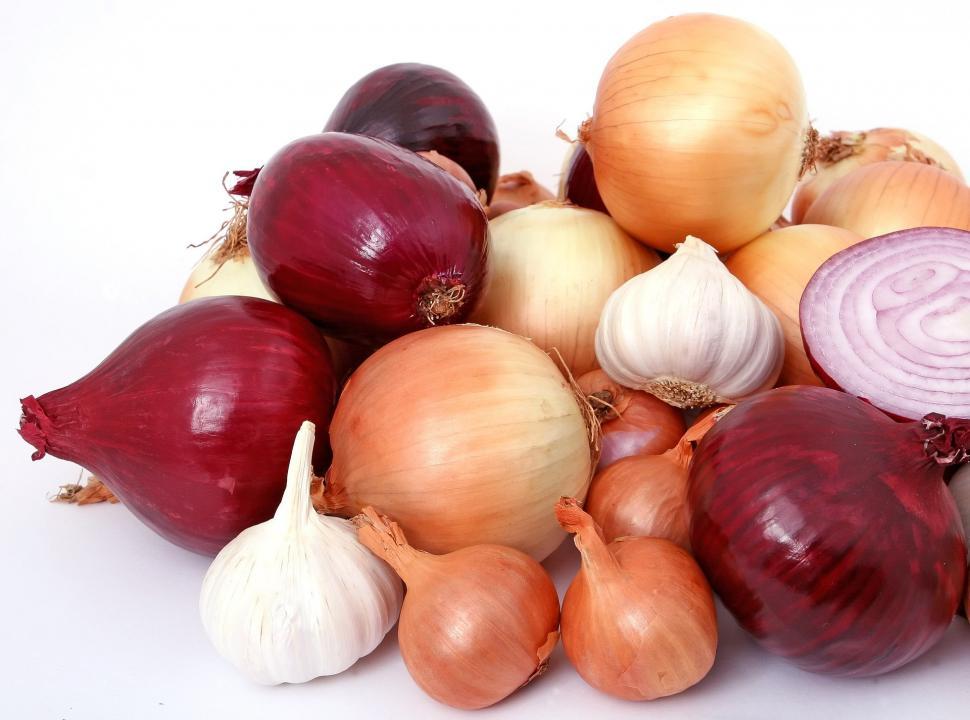 Free Image of A Pile of Onions and Onions Next to Each Other 