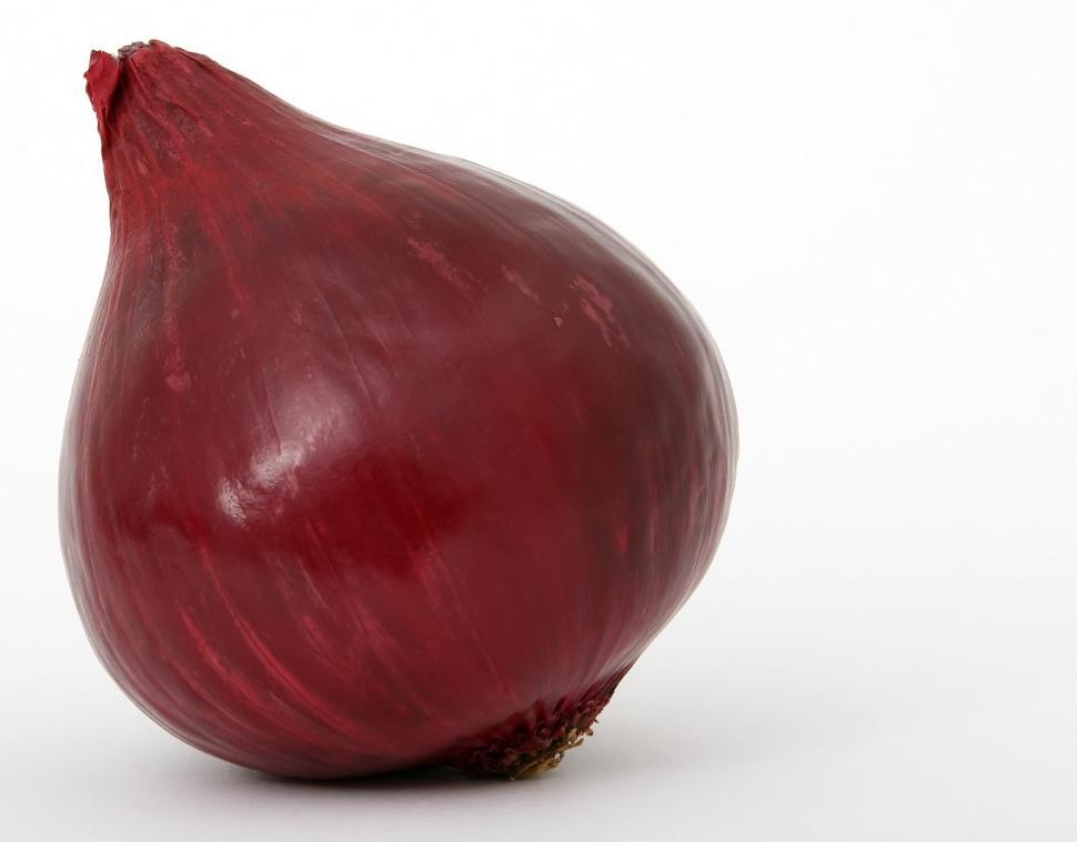 Free Image of Close Up of a Red Onion on White Background 