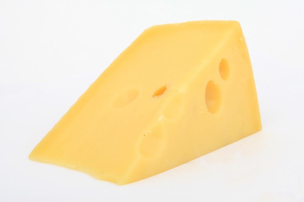 Free Image of Slice of Swiss Cheese With Holes 