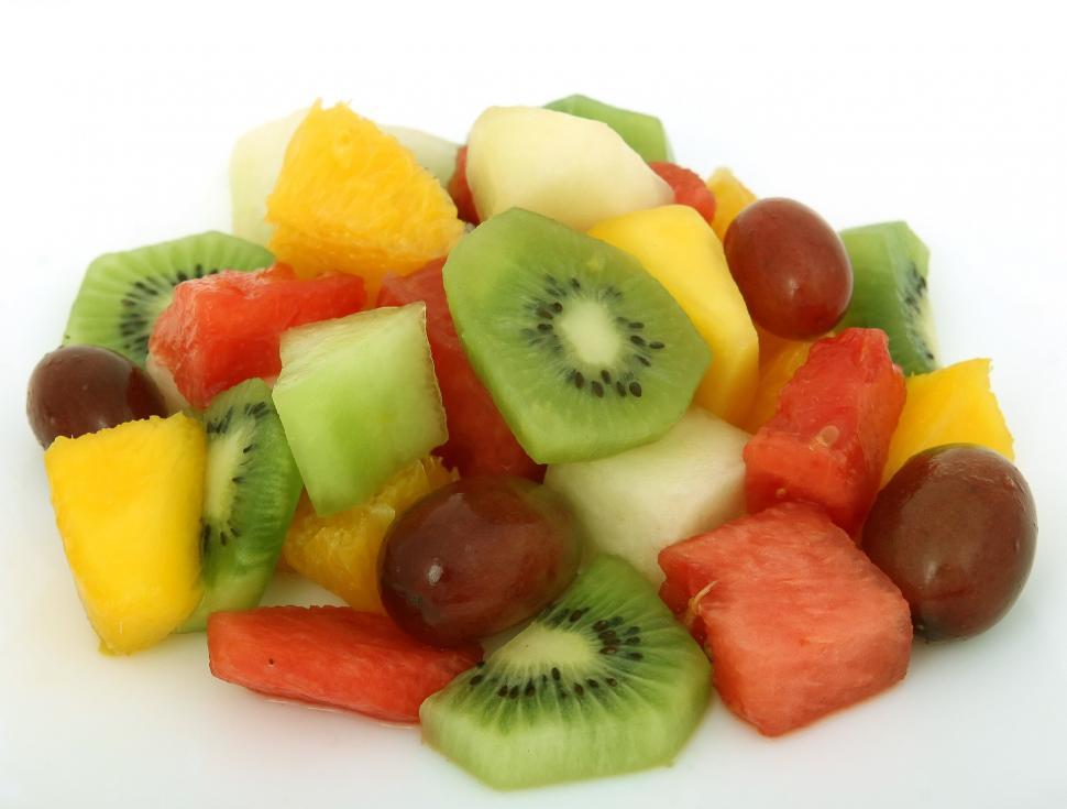 Free Image of Pile of Cut Up Fruit on White Table 