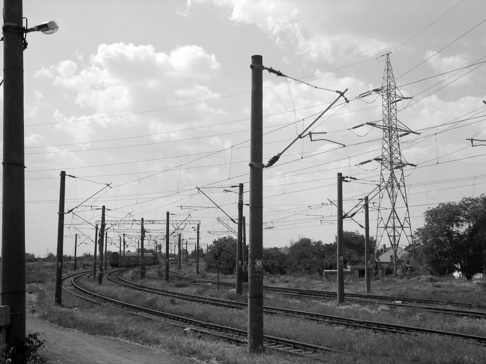 Free Image of Black and White Photo of a Train Track 