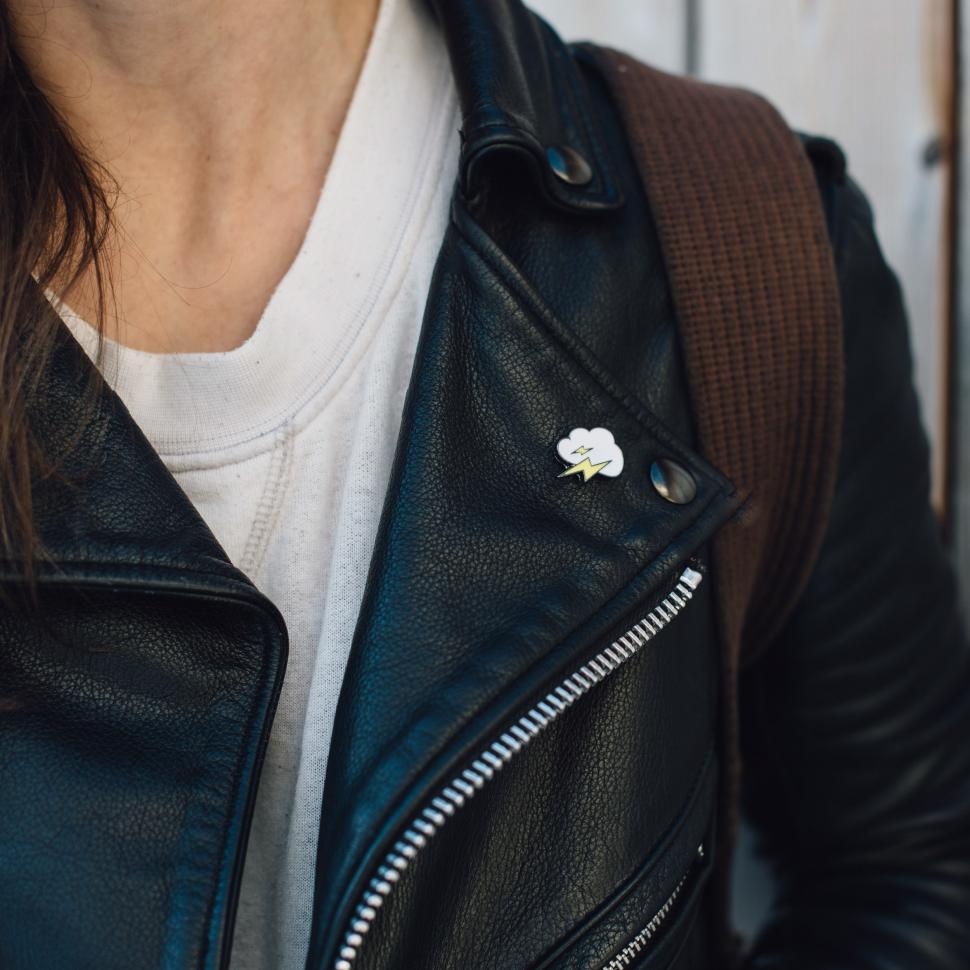Free Image of Enamel Pin on Leather Jacket 