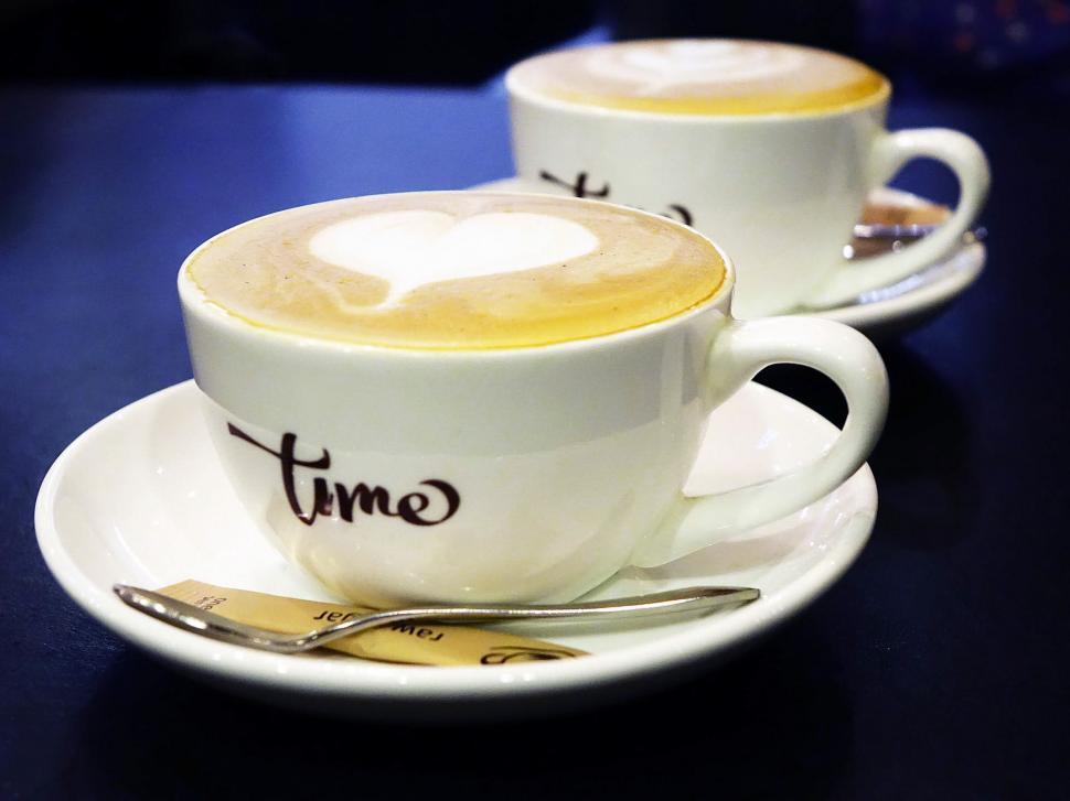 Free Image of Two Cups of Coffee on a Saucer 