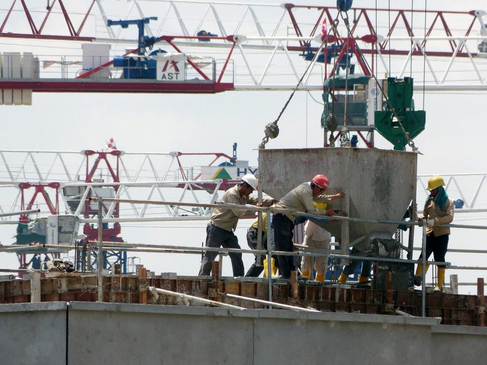 Free Image of Workers at the Site pouring 