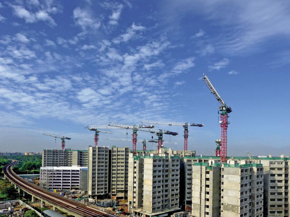 Free Image of Large Building Under Construction Against Sky Background 