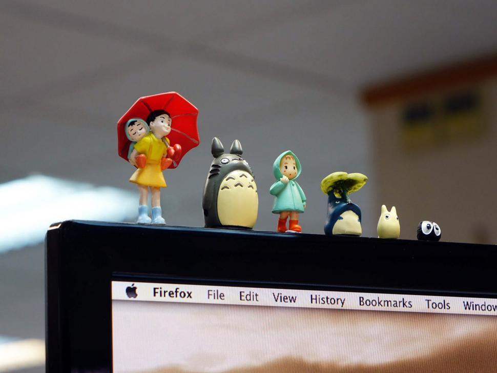 Free Image of Figurines on Monitor 