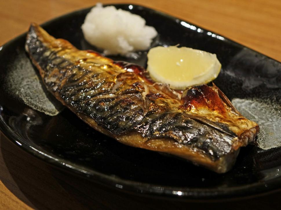 Free Image of Black Plate With Piece of Fish 