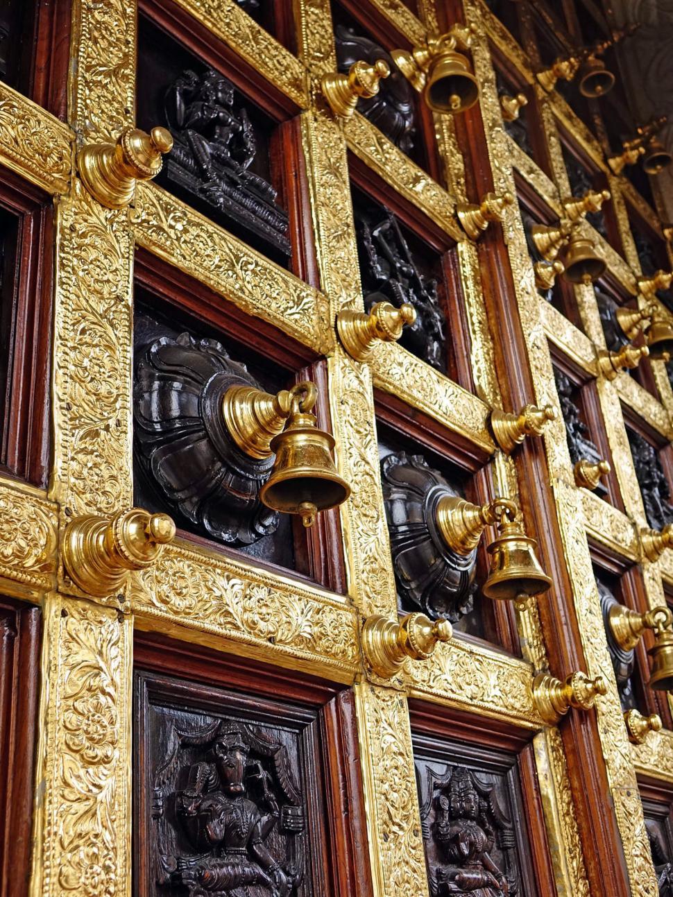 Free Image of Close Up of a Gold and Black Door 