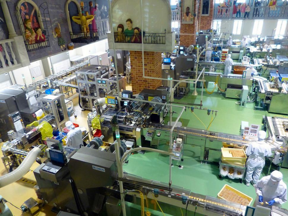 Free Image of Busy Factory Floor With Machines and Workers 